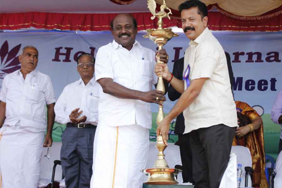 Felicitating Mr. Vikrama Raja, State President of Merchant Association